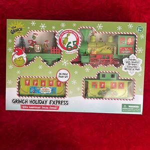 Dr. Seuss The Grinch Holiday Express 65th Anniversary Special Edition Train Set.
